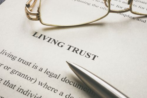 Info about Living trust and glasses on it.