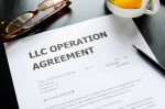 A limited liability company operation agreement with pen